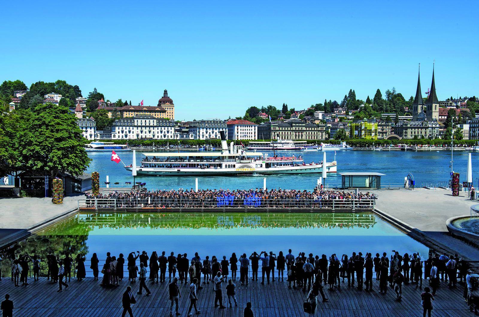 BHMS graduates in gowns at the graduation ceremony in Lucerne