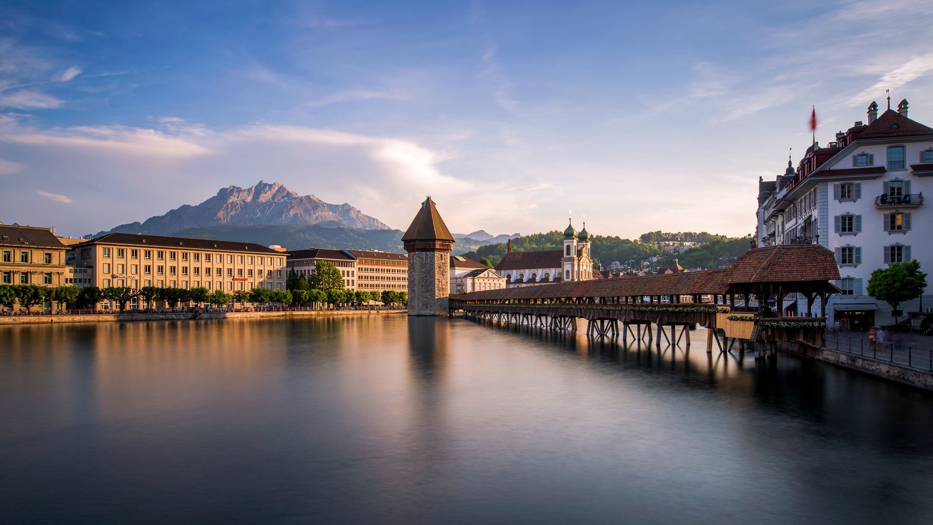 Lucerne's Chapel Bridge and water tower at sunset