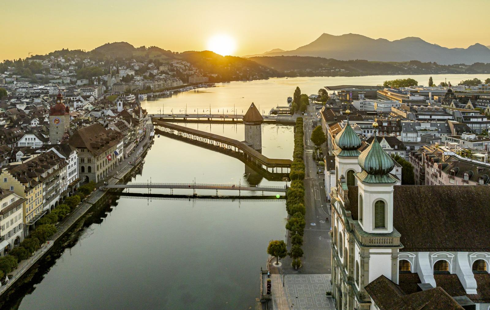 Panorama of Lucerne on its lake with the surrounding mountains behind