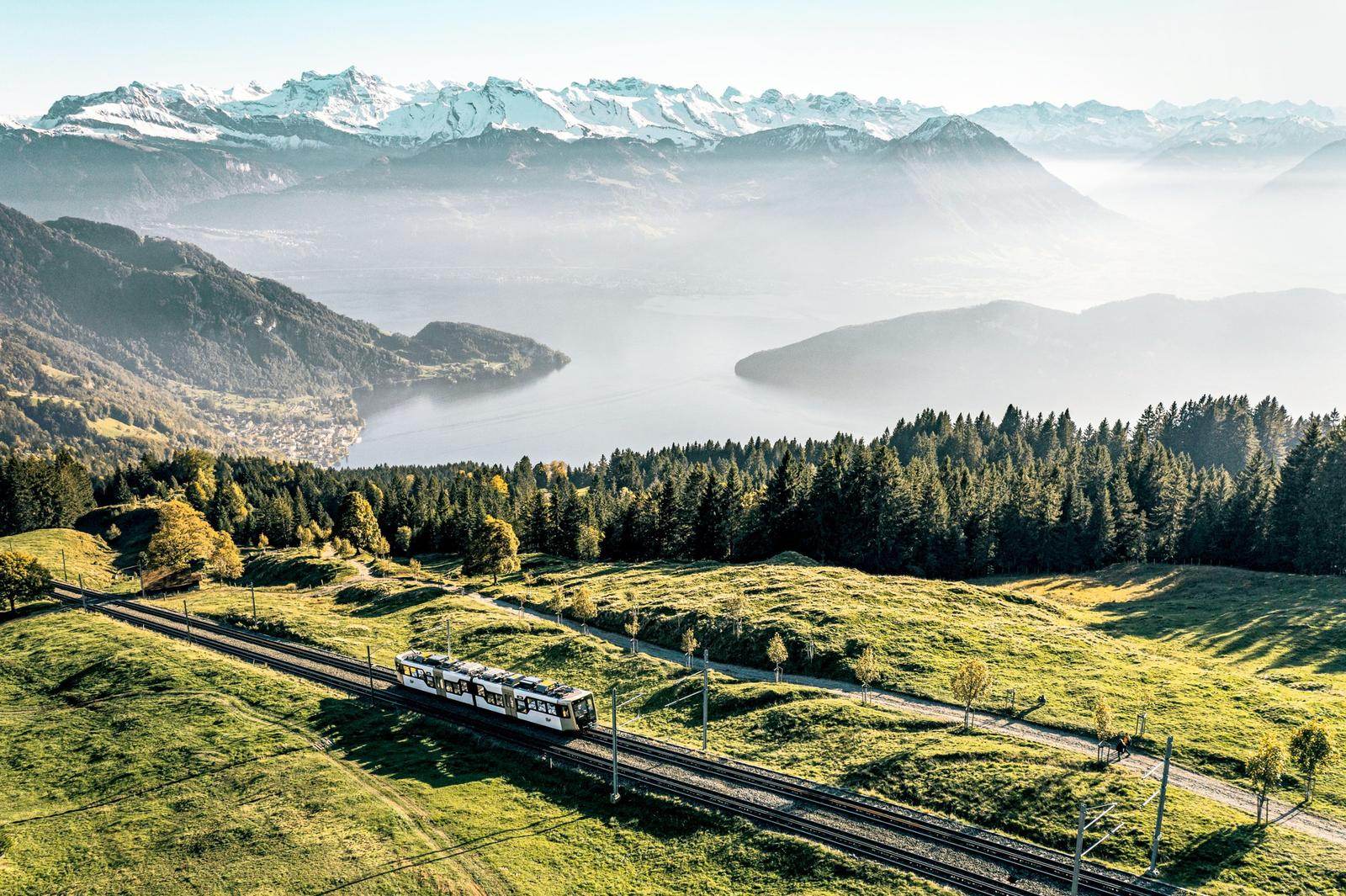 Cogwheel railway climbing Mount Rigi above Lake Lucerne